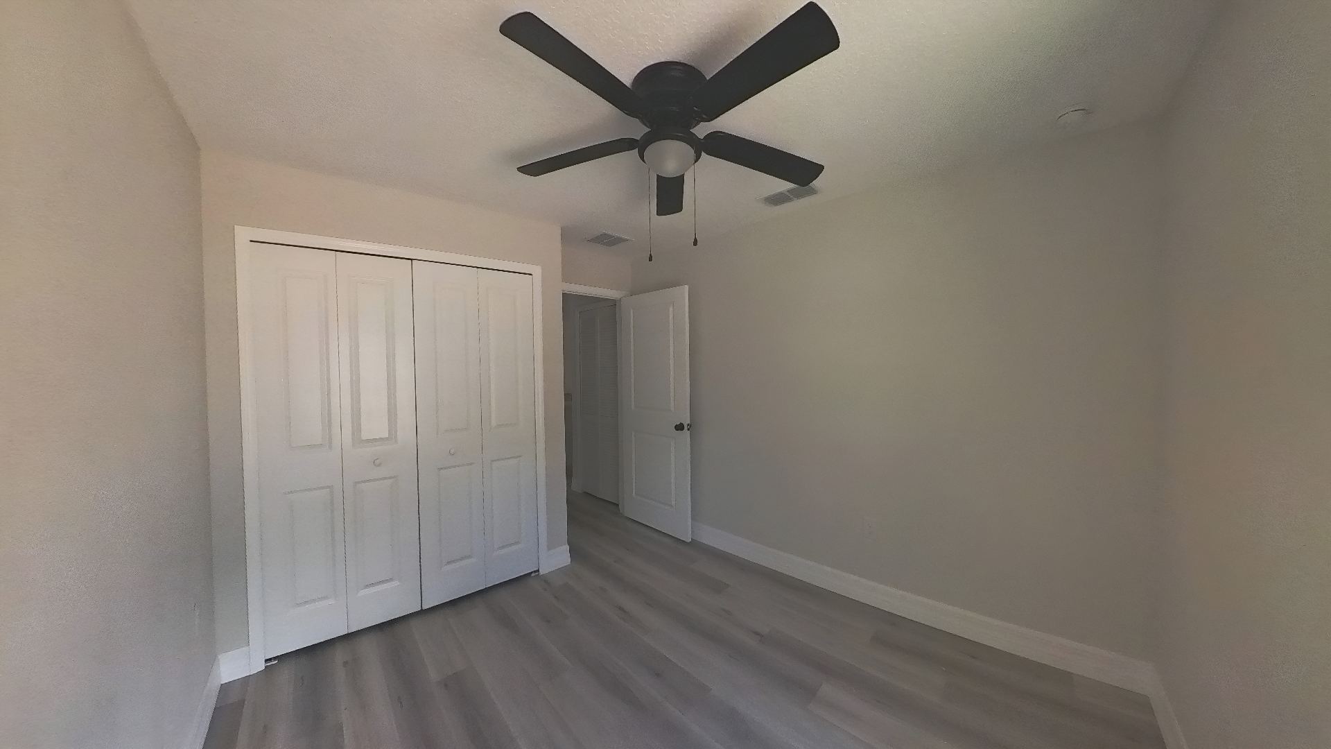 Bedroom with LVP flooring