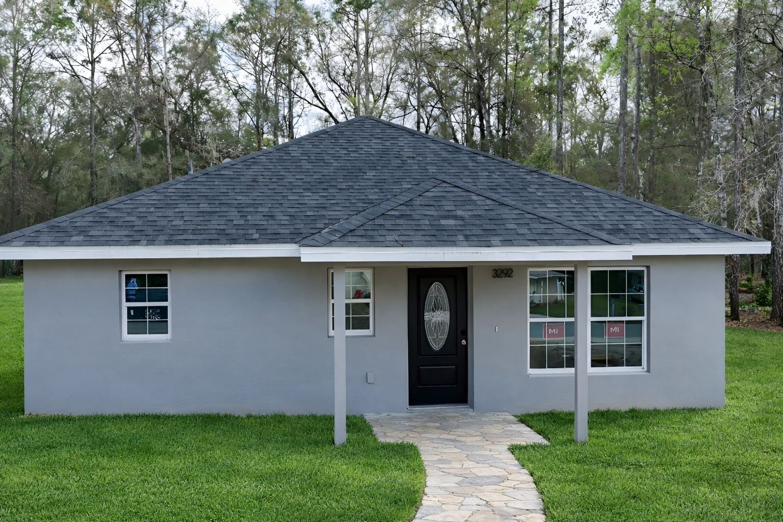 The Sabal Palm front exterior, 3292 E Porter St, Inverness